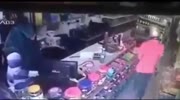 Sword Wielding Thief get owned on a cctv Video