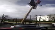 Huge pole collapses and crushes the cars