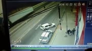 Rider falls under the truck
