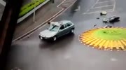 Rider finds himself on the roof of a car