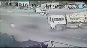 Amazing Accident where the truck runs completly over a motorcyclist and his rider.