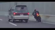 Biker hits the fencing and leaves his friend on the road