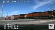 Dashcam Footage Of Train Smashing Into Tow Truck