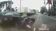 Rider falls under the car when other driver opens the door and hits him
