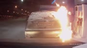 Dashcam captures idiotic driver accidentally set car on fire at petrol station after inspecting pump.