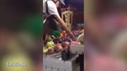 Man filmed URINATING on fruit stall in front of stunned onlookers claims it helps keep produce CLEAN