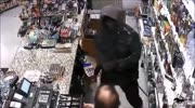 Armed Robber Fighting Store Clerk Caught On CCTV
