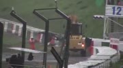 Racing car hits excavator on full speed