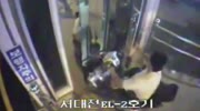 Asian breaks elevator and his neck