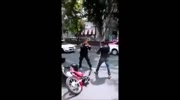 Mexican biker fights with a cop