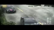 Driver reverses car into river in E China - hitting motorcycle on the way