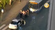 Naked fat stops bus middle of road and bites cop