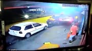 Speeding car hits bike and snash people in a bar.