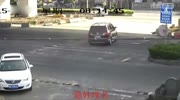 Oblivious driver of van pulls in front of semi-truck and gets crushed.