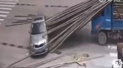 Car Gets Pierced By a Truck load Of Bamboo