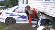 Rally car dives in someones house