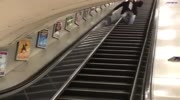 Drunk man decides to show a trick on the escalator