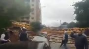 Massive Crane fall on cars