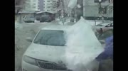 Falling Ice destroys car