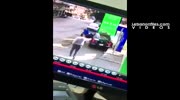 Man In Blue Jump Suit Crushed By Out Of Control Car.