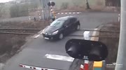 Car is blown away by a train