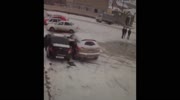 Man Sandwiched between two cars