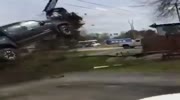 High speed chase in Louisiana ends with Toyota Tacoma flying airborne and crashing on car.