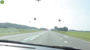 Jets and more do very low flyover above a Dutch highway.