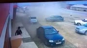 Driver Is Ejected From His Car Against A Building.