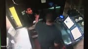 McD employee fights a man who tries to jump into drive thru window