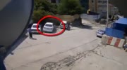 Man leaves his car before its crushed by a gravel truck
