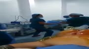 (Uncensored) Doctors and nurses fired after outrageous video shows them mocking naked man on surgery table.