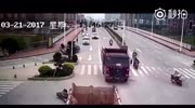 Rider gets crushed by a red truck