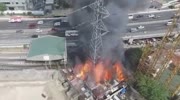 high voltage tower collapses in flames