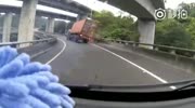 Trailer truck falls from an overpass