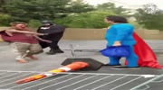 Superman fights a homeless guy.
