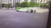 Heavy truck falls on car
