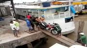 Loading a bike on a boat go's wrong.