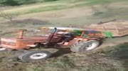 Farmer Crushed By His Own Tractor.