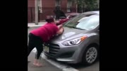 Fat drugged woman attacks a car