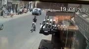Motorbiker Crushed By Oncoming Truck.