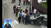 Car runs over a girl on the sidewalk