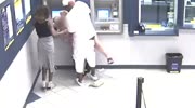Man of color robs woman at ATM