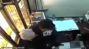 Old store owner fights armed robber