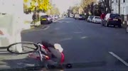 Man on bicycle falls hit by car door