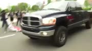 PICKUP TRUCK PLOWS THROUGH NC MAY DAY MARCH