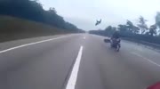 Guy on bike loses it