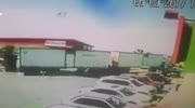 Trailer truck damages gas station