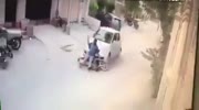 Men on mopeds are knocked down by car