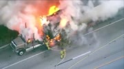 Tow truck burns in flames